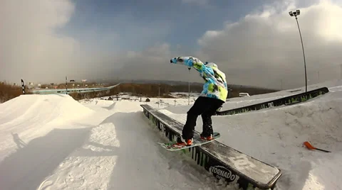 Snowboarder jumps trick Stock Footage 35456215