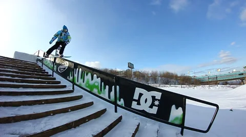 Snowboarder jumps trick Stock Footage 35456496