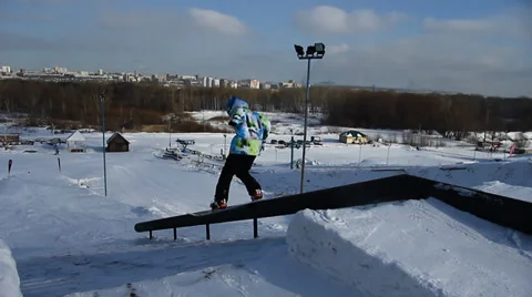 Snowboarder jumps trick Stock Footage 35456503