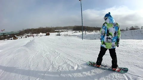 Snowboarder jumps trick Stock Footage 35456535