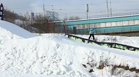 Snowboarder jumps trick Stock Footage 35456546