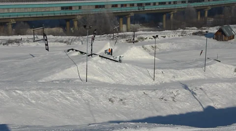 Snowboarder jumps trick Stock Footage 35498579