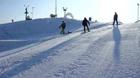 Snowboarder jumps trick Stock Footage 35498589