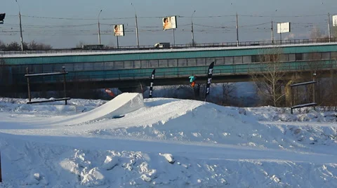 Snowboarder jumps trick Stock Footage 35498938