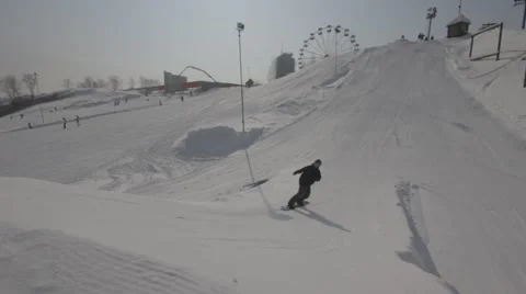 Snowboarder jumps trick Stock Footage 41235510