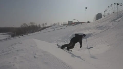 Snowboarder jumps trick Stock Footage 41235514