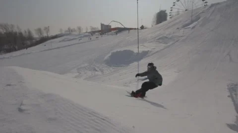 Snowboarder jumps trick Stock Footage 41235523