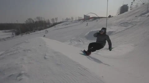 Snowboarder jumps trick Stock Footage 41235553