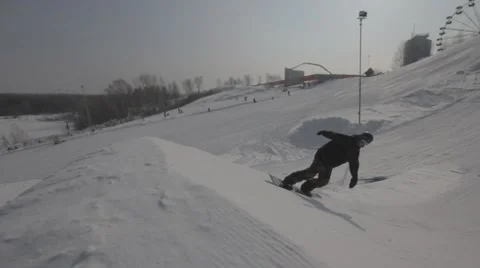 Snowboarder jumps trick Stock Footage 41235563