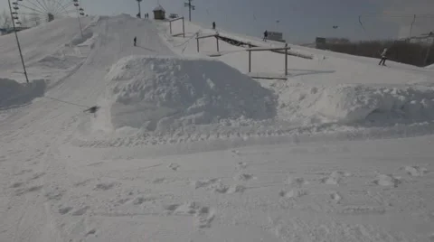Snowboarder jumps trick Stock Footage 41235641