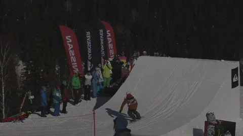 Snowboarder jumps trick Stock Footage 47842082