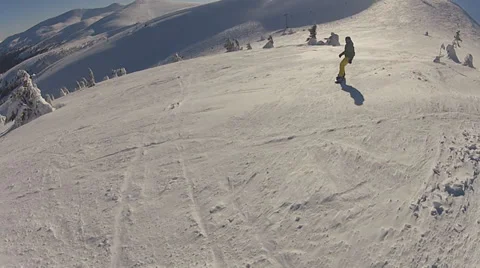 The snowboarder learn to ride Stock Footage 36021356