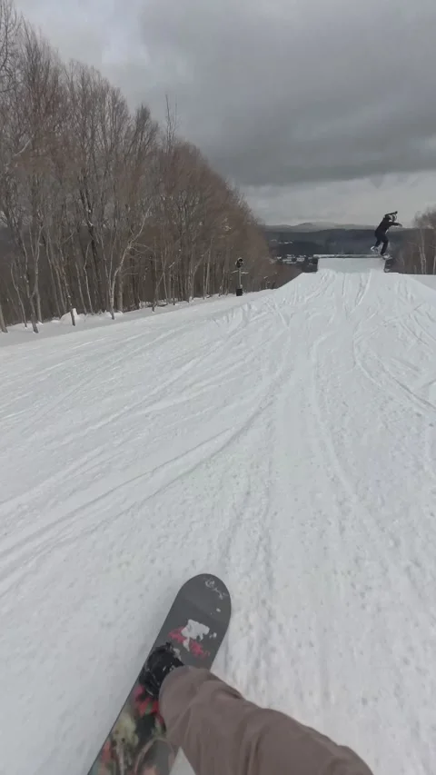 Snowboarder Learns About Not Slowing Down in the Terrain Park, Dover, Vermont, U Stock Footage 323865115