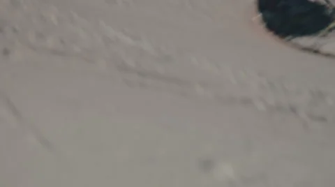 Snowboarder rides closeup Stock-Footage 64870143
