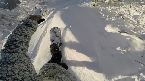 Snowboarder Rides Through the Mountains First-Person View Stock Footage 67554859