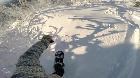 Snowboarder Rides Through the Mountains First-Person View Stock Footage 67554961