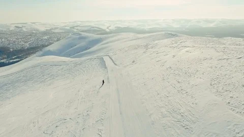 Snowboarder rides on the track. Stock Footage 72982600