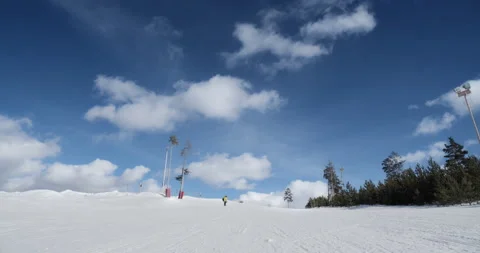 Snowboarder rolls down the mountain and jump Stock Footage 150363308
