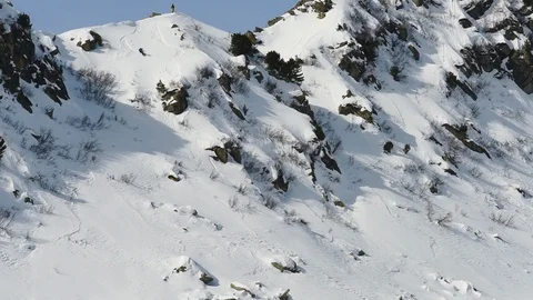 Snowboarder skiing on fresh snow off piste Stock Footage