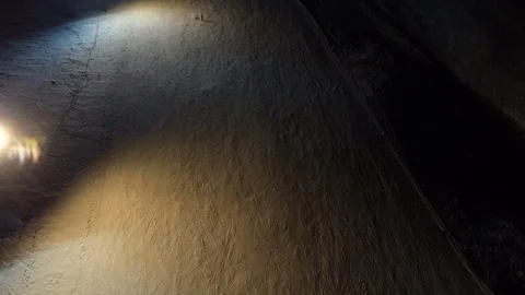 Snowboarder sliding alone down the slope at night. Stock Footage 69938667
