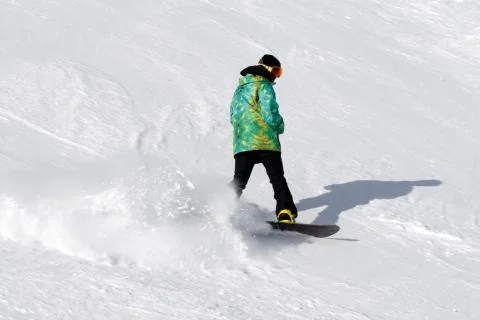 Snowboarder on the slope Stock Photos