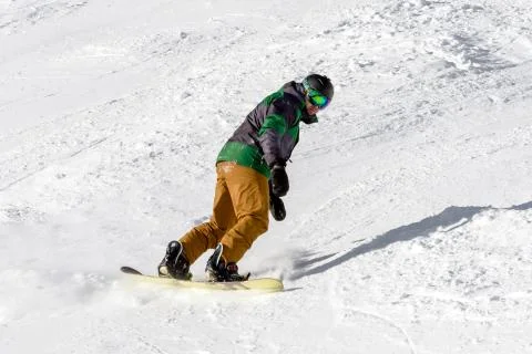 Snowboarder on the slope Stock Photos