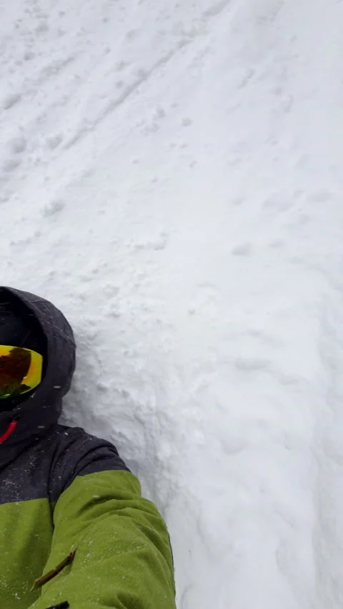 Snowboarder at the slope stop to rest Stock Footage 218581570