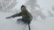 A Snowboarder Splashes Snow And Disappears In A Cloud Of White Snow. Stock Footage