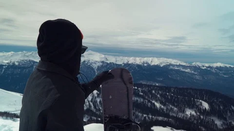 Snowboarder on top of the mountain Stock Footage 112141917