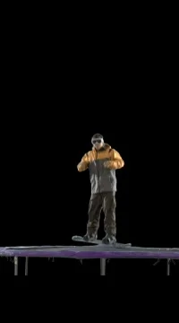 Snowboarder on trampoline. Stock Footage 79658