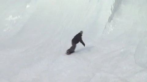 Snowboarder Trying Out a Trick 2 Stock Footage 26068846