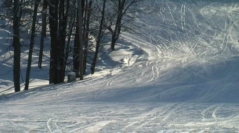 Snowboarders going by3 Stock Footage