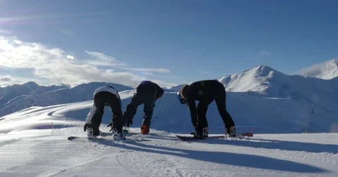Snowboarders Hitting Slopes 4k Stock Footage 45677481