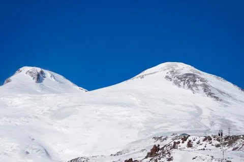 Snowboarding and skiing. The peaks of Elbrus. North Caucasus Russia. Stock Photos