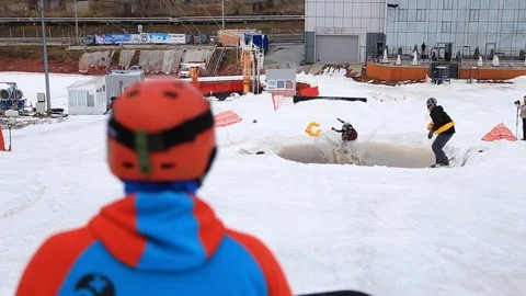 Snowboarding down the pool view because of the extreme Video stock 88811040