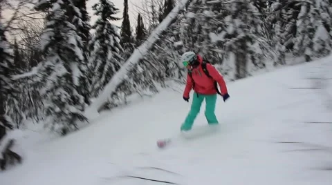 Snowboarding in forest Stock Footage 40935705