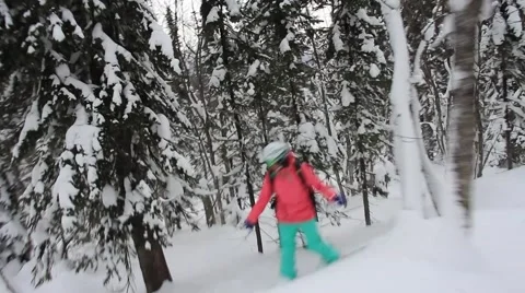 Snowboarding in forest Stock Footage 40936284