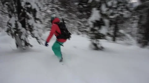Snowboarding in forest Stock Footage 40936447