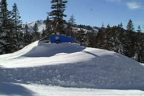 Snowboarding jumps and rails Stock Footage 10702284