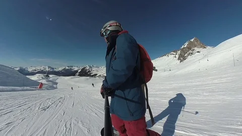 Snowboarding looking back fast blanchets Stock Footage 109512196