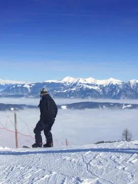 Snowboarding over the clouds Stock-Fotos