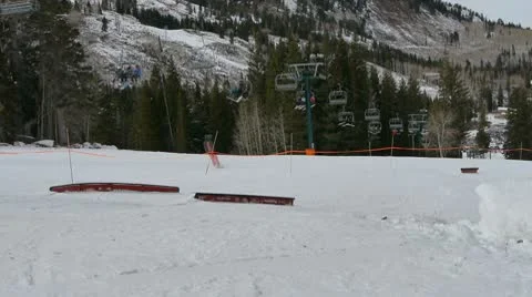 Snowboarding rail park Stock Footage