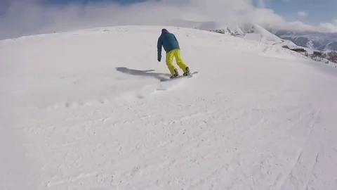 Snowboarding side view Stock Footage