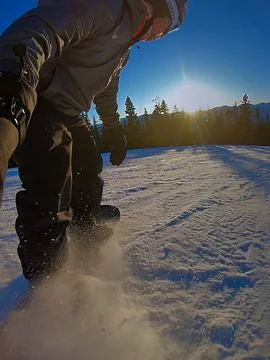 Snowboarding at sundown Foto stock