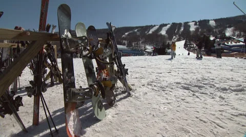 Snowboards and Skiis - 2 Clips in One Stock Footage 26073696