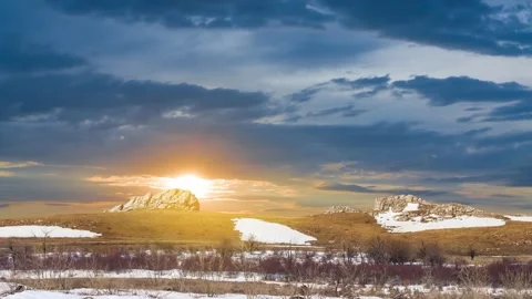 Snowbound mountain ridge at the dramatic sunset Stock Footage 333670346