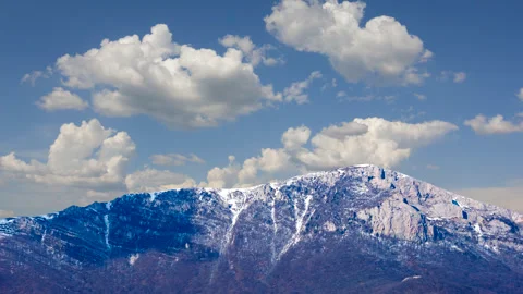 Snowbound mountain top time lapse scene Video stock 279178606