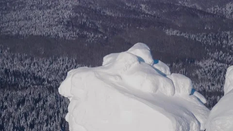 Snowcapped Cliff of Mount Polyudov Stone in the Urals, Russia, on Clear Sunny Video stock 153211373