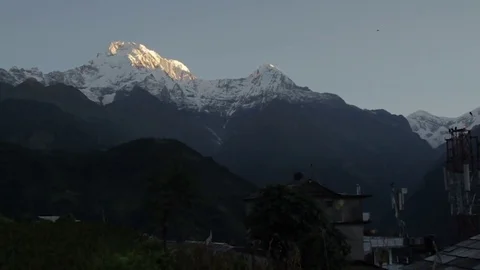 Snowcapped Himalayan Mountain with Bird Flying Past in Blue Sky. Stock Footage 85295879