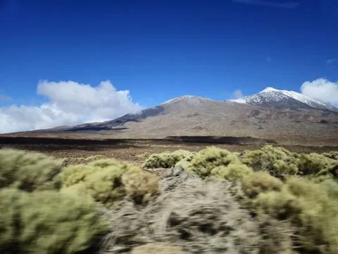 Snowcapped mountain landscape under clear blue sky Stock Photos